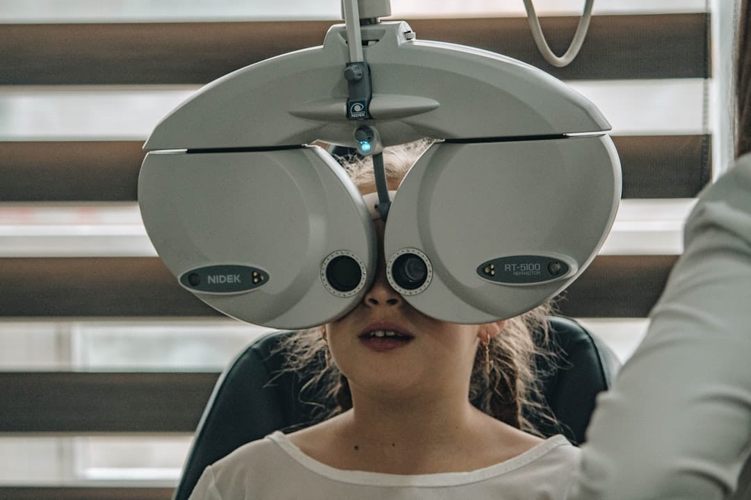 An ophthalmologist examines a patient's retina during a clinical eye assessment.